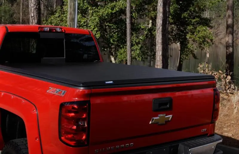 Lund Hard-Fold Tonneau Cover – Black, Designed For 2015–2018 Ford F-150 Styleside With 5.5-Foot Bed 1